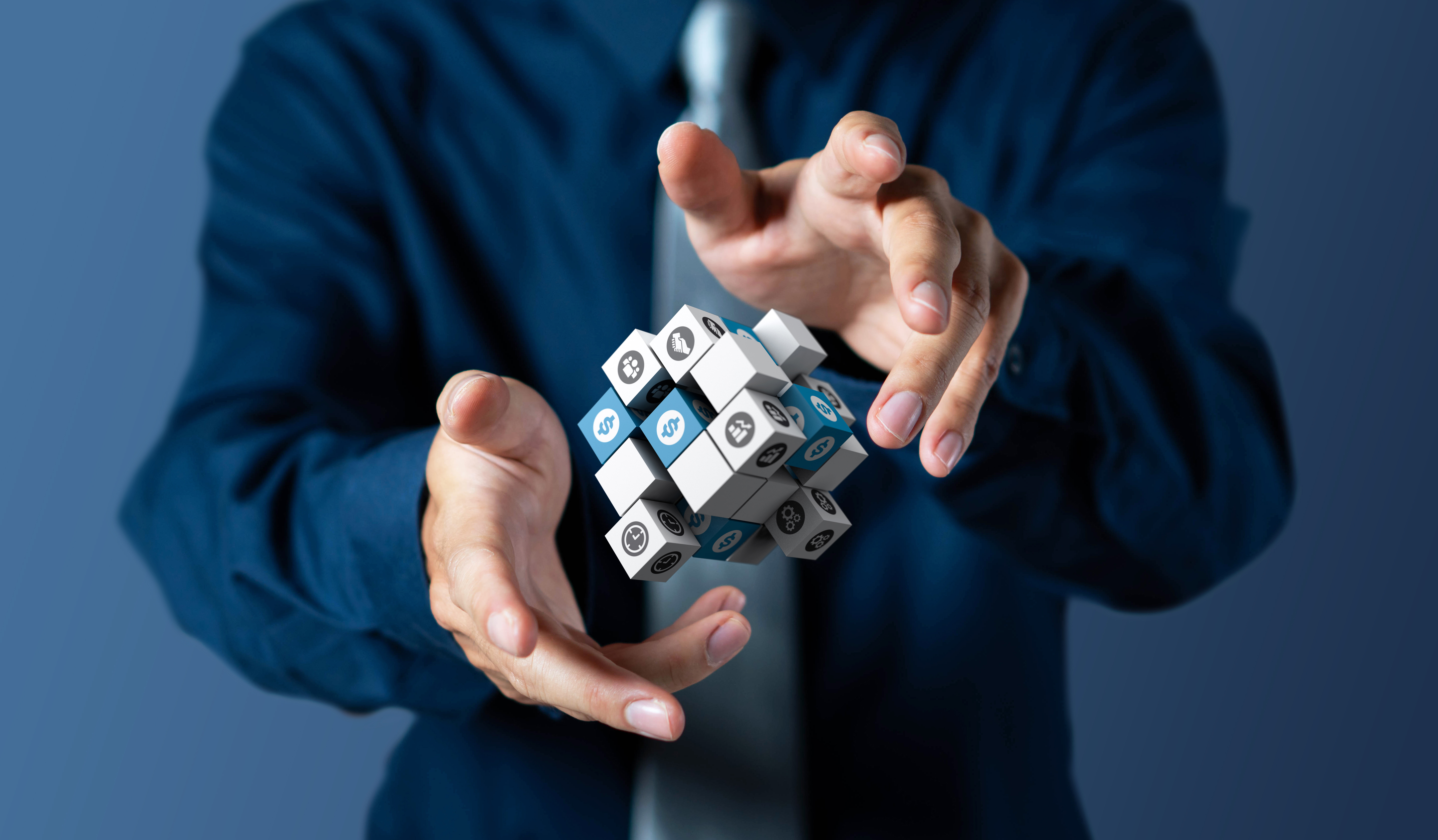 businessman-controls-management-3d-cubes